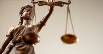 scales of justice representing misdemeanor and felony in midland and odessa texas