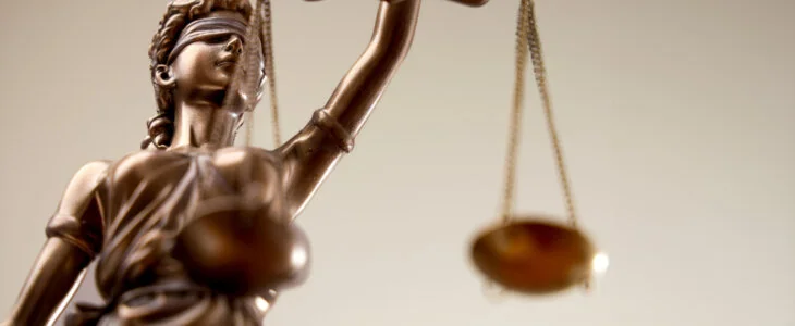 scales of justice representing misdemeanor and felony in midland and odessa texas